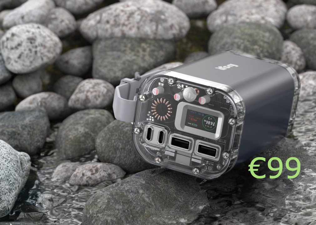A compact, gray portable power bank with multiple ports and a digital display sits on wet river rocks, with a green "€99" price label overlayed in the corner.