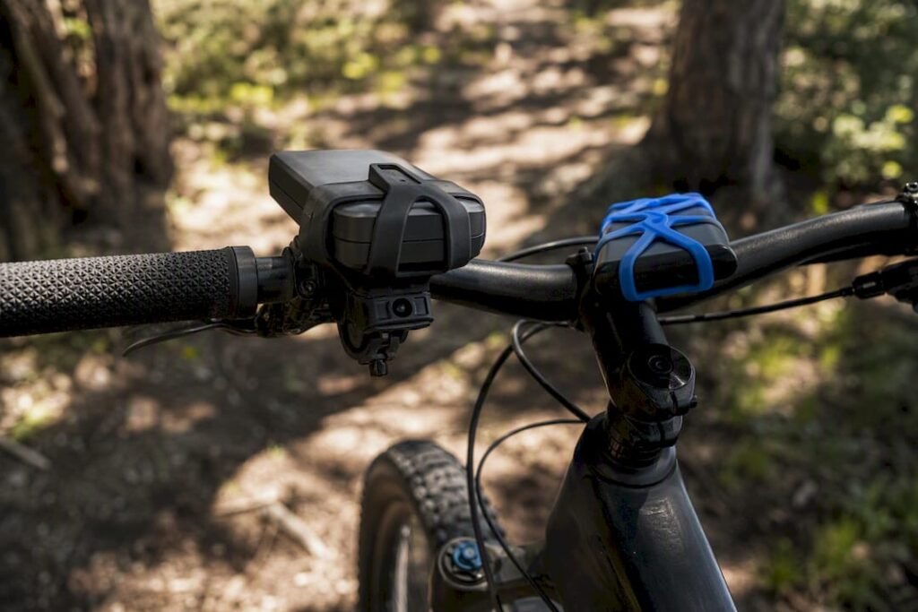 Close-up of bike handlebar power bank mounts