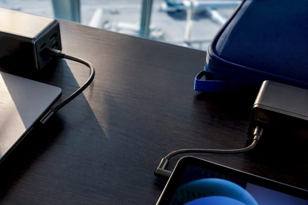 Anonymous chargers beside travel devices